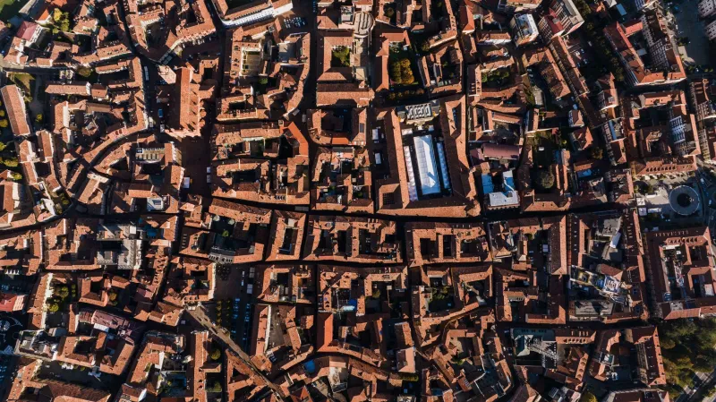 Give Your Home Base a Pulse: Running a City That Grows Between Sessions
